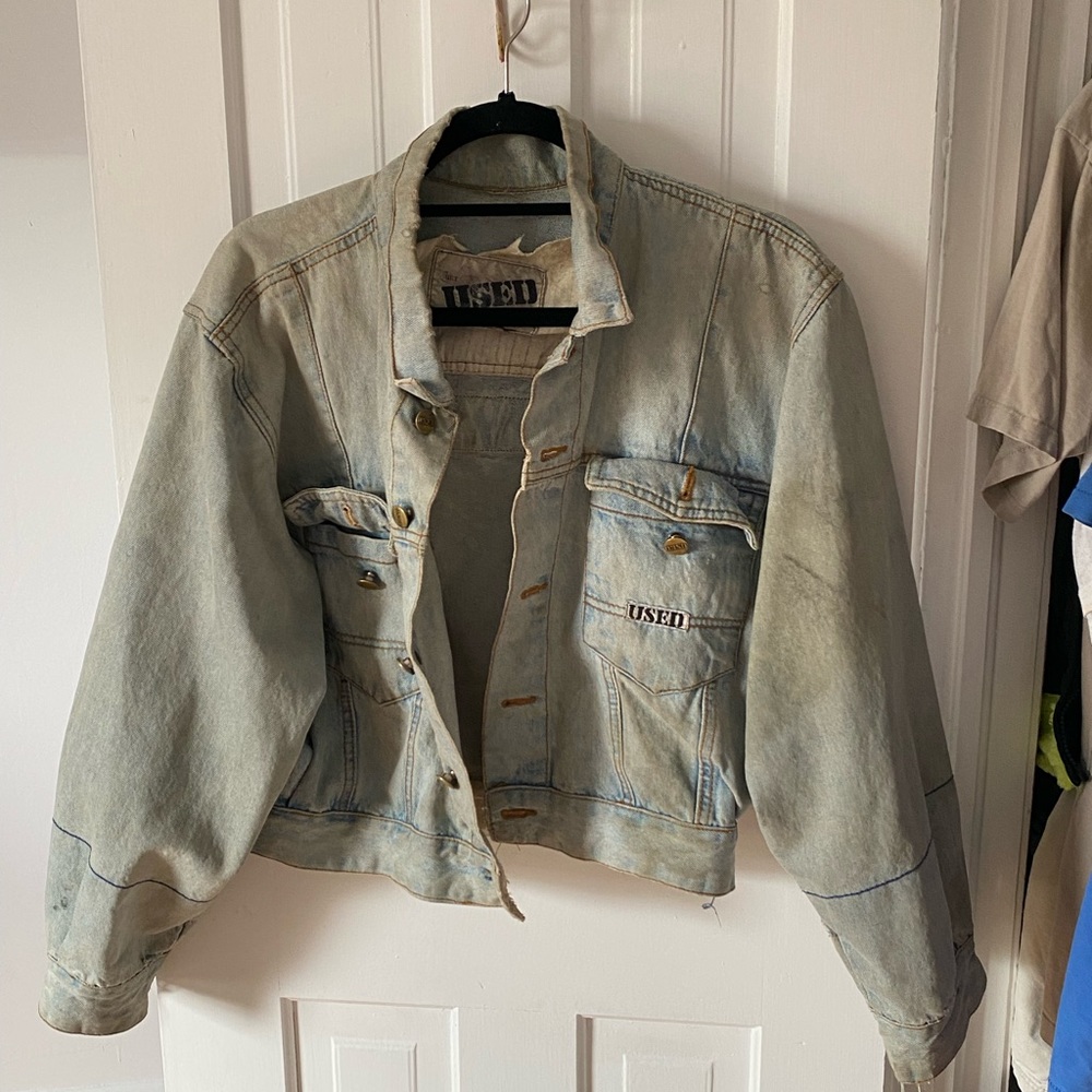 Distressed vintage denim jacket